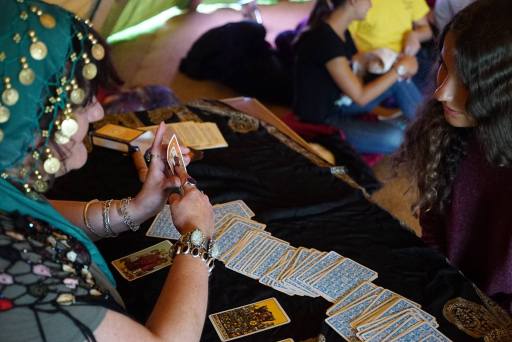 Gypsy Sybella reading at a festival at Street