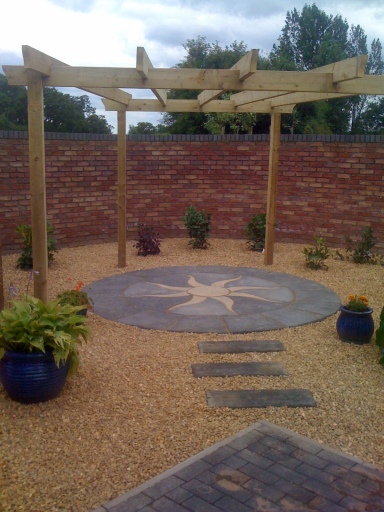 Aztec sun circle with Pergola