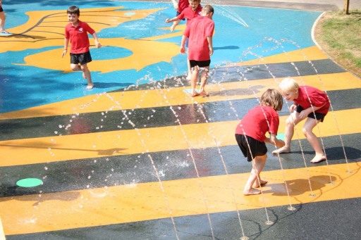 Wet pour safety surfacing