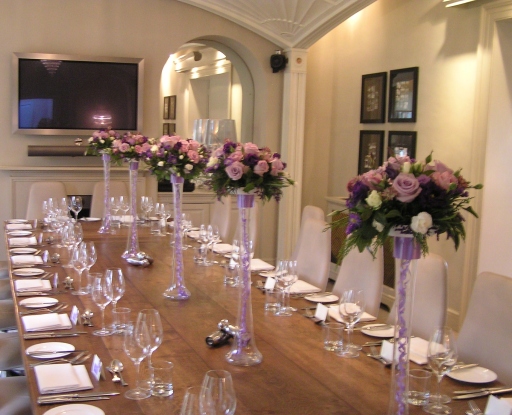 Stunning table arrangements by Floral Creations by Catherine