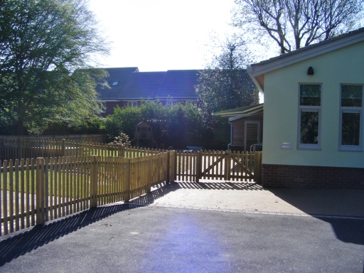The enclosed outdoor play area at Little Berries Pre-School
