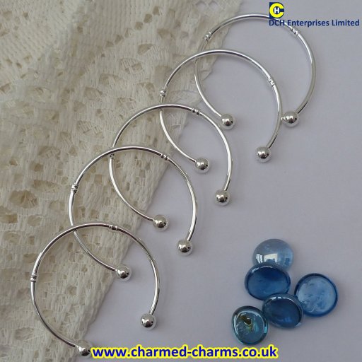 Silver Plated Twist Line Patterned Torque Charm Bangles