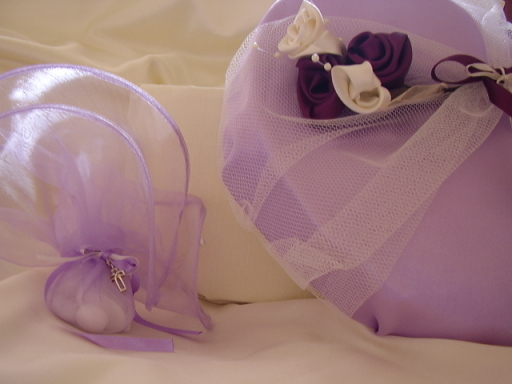 Satin hat box filled with wedding favours