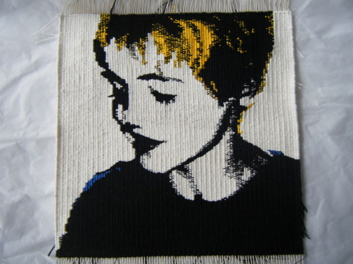 Handwoven portrait of a boy, handwoven tapestry, tapestry portrait