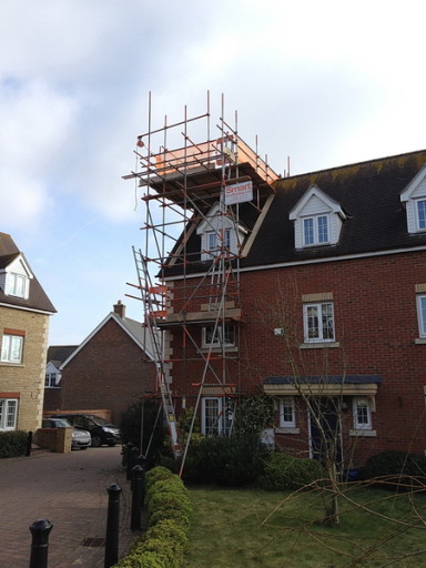 access to chimney with saddle over roof