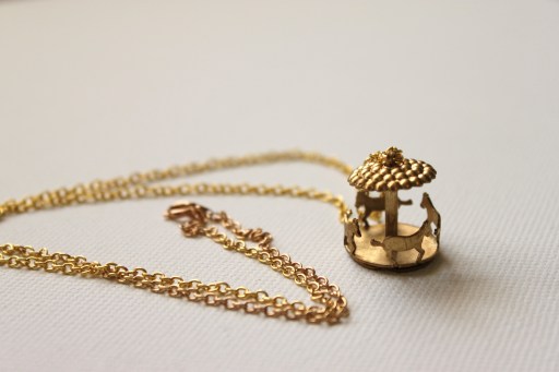 whimsical merry-go-round necklace. kitsch and fun