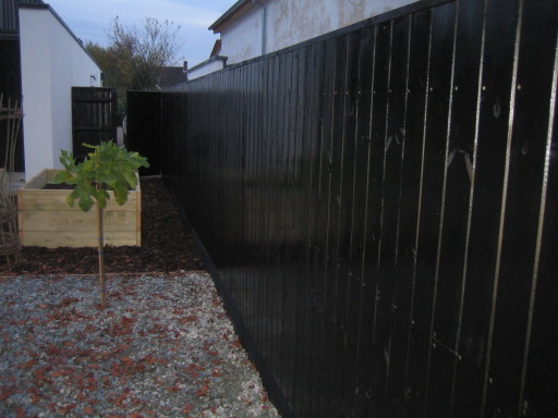 Exterior varnished toungue and groove fencing in bucks