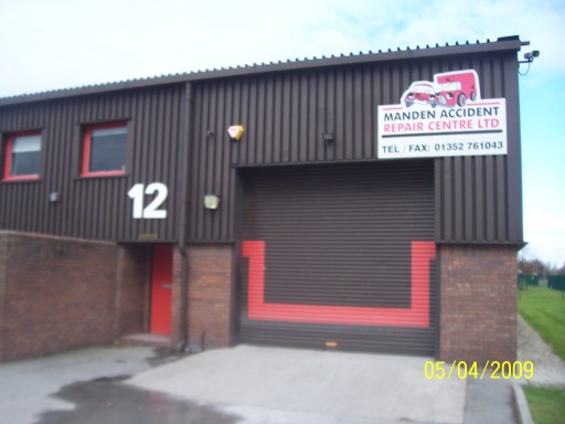 The main entrance and roller door to paintshop