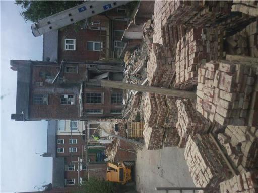 3 storey town house taken down by hand