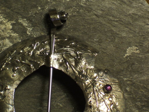 Sterling Silver and Amethyst Pennanular pin from the 'Unearthed' range