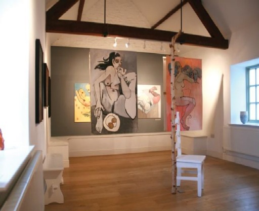 the upper gallery is full of original contemporary art, lower gallery a Barista coffee house.