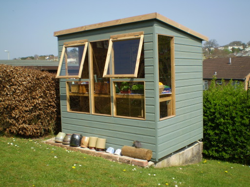 garden shed painted with wood preservative