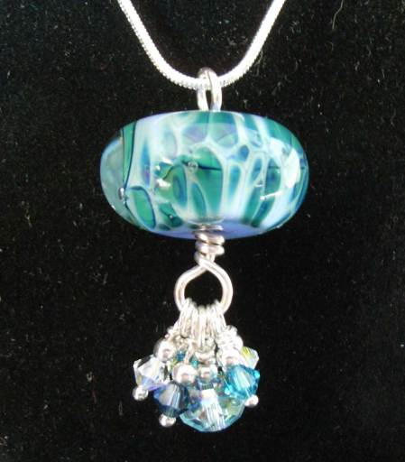 Hand made cluster pendant.