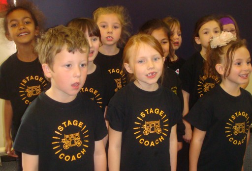 Students in our Early Stages class getting to grips with a new song.