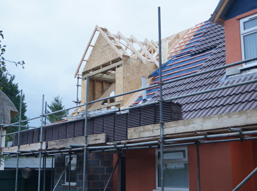 New dormer window built into the roof line.