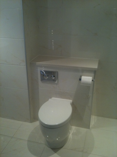 Back to wall pan, and hidden cistern with Corrion worktop in glasgow