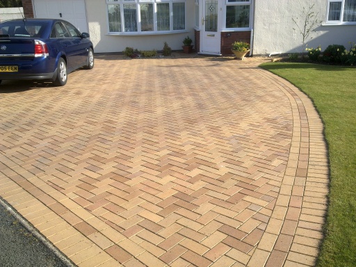 Clay block paving laid for a retired police officer by Gardenscape in Abergele.
