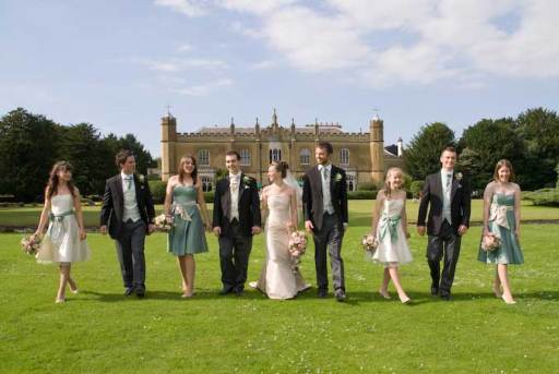 The bridal party walking along at Missenden Abbey