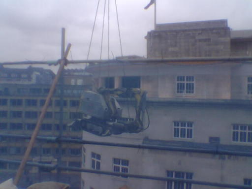 there's no place we cant get to. brokk remote carrier be lifted on to a office block roof in bristol