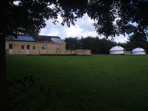 View of yurts and amenity building