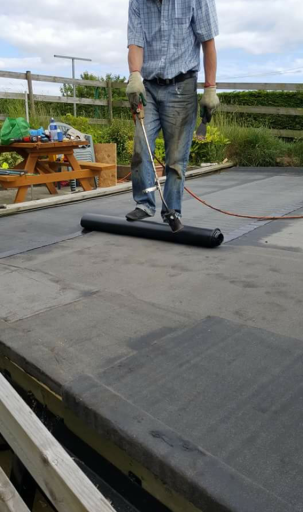 torch on felt roofing project