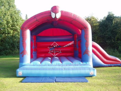 large spiderman castle with slide and shower cover