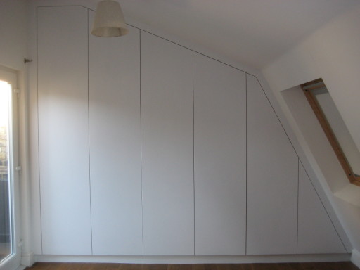 Loft wardrobe after doors added