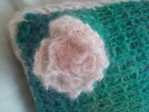 Hand-knitted mohair flower cushion