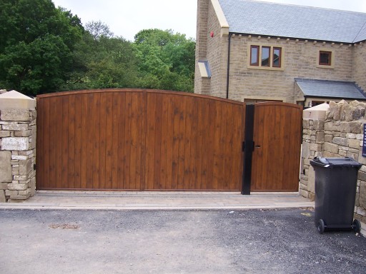 Stell framed timber clad swing gate with Ped gate