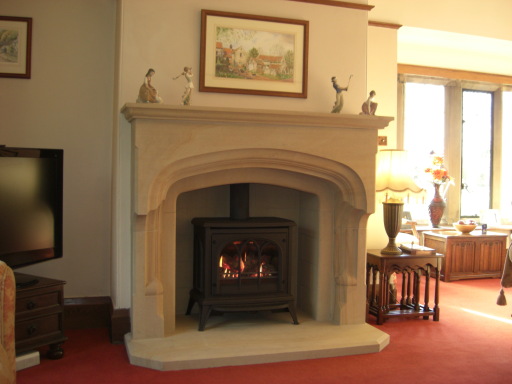 Wharfe fireplace with woodburning stove