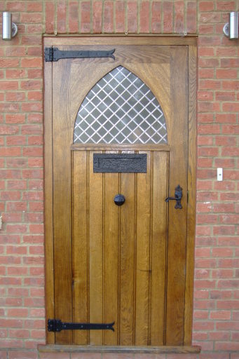 Bespoke oak door with leaded glass and antique ironmongery