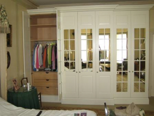 Large painted and mirror glazed breakfront wardrobe with cedar lining for wool protection