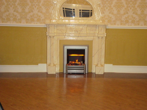 vinyl planking floor and marble effect fireplace