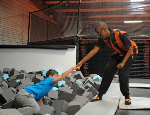 Bounce Staff Member Giving a Helping Hand