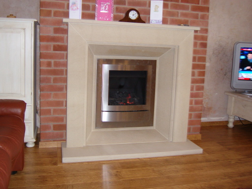 Stone Srround with inset Fire
