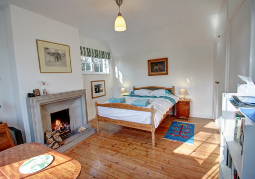 Tastefully furnished, light, sunny room.