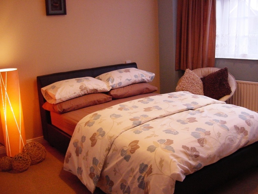 leather bed with quality matress and luxury linen