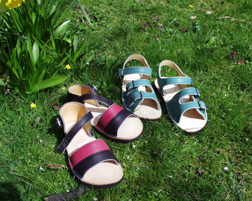 Open back Tracker and Sandie. Leather tops and insoles, rubber soles.