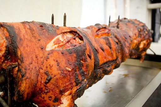 Golden crackling covering tender moist hot delicious pork