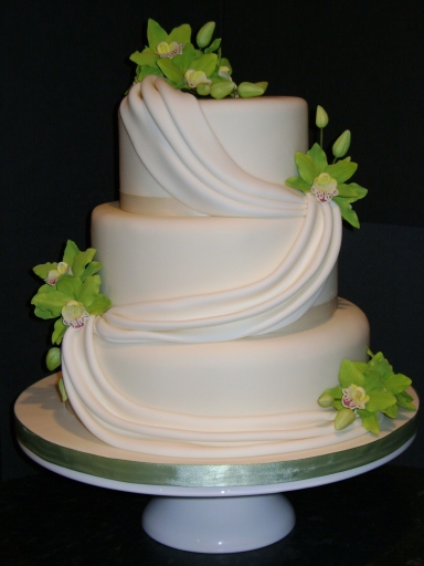 Orchids &amp; swags wedding cake
