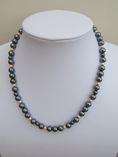 Mystic - The necklace is made from Hematite with a sterling silver clasp.