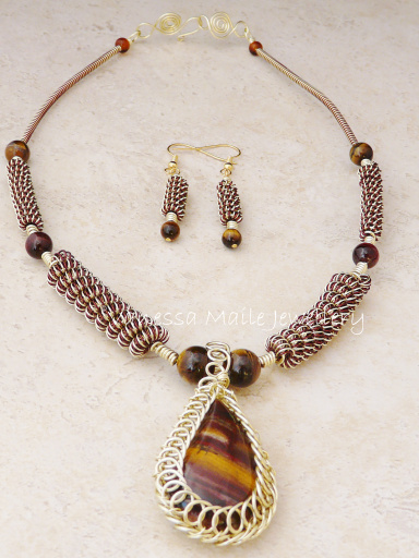 Stunning handmade Tigers eye and coiled wire necklace and earrings