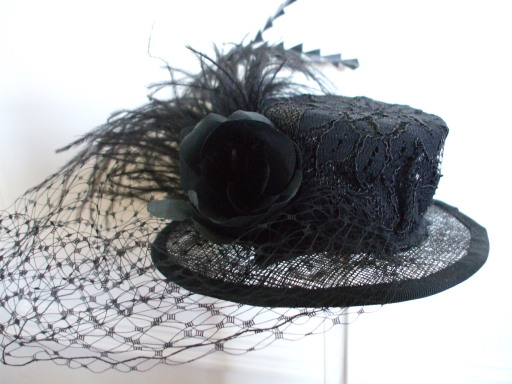 'Petit - creation' with hand made silk rose detail. Now in the possession of a talented sculptress!