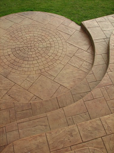 Pattern imprinted concrete yorkstone patio with cast in-situ steps