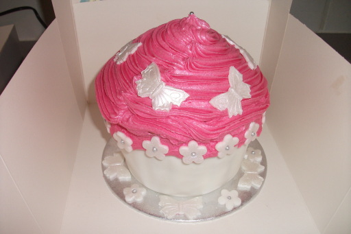 Giant pink and white vanilla cupcake