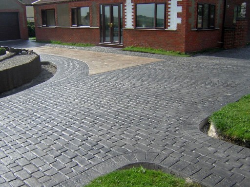 Stamped concrete yorkstone & cobble driveway