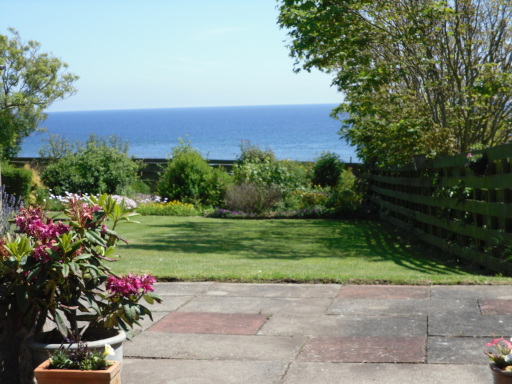 Garden overlooking North Sea &amp; village