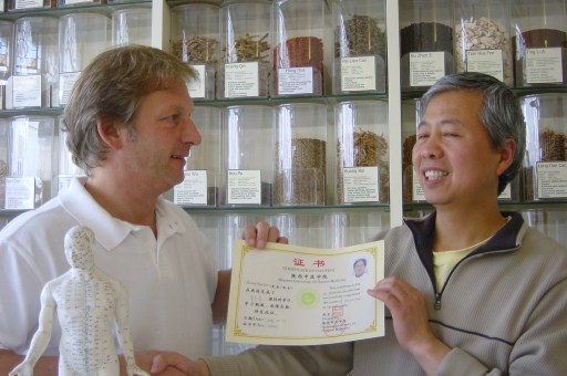 Tom receiving his Shaanxi University award from Dr Zhao