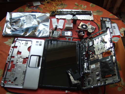 A Laptop striped Bare and left on a table