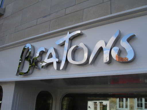 built up polished steel letters
